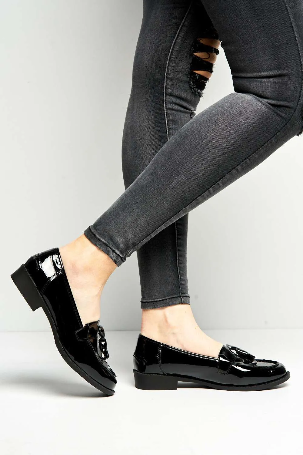 Radley Flat Fringe Toggle Loafer in Black Patent