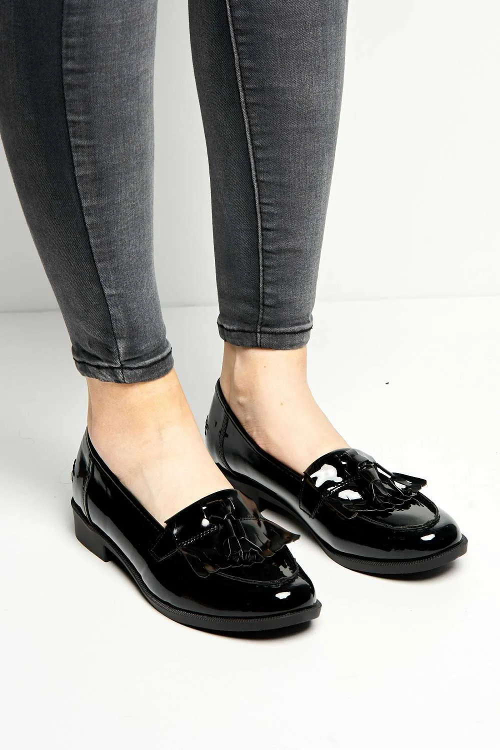 Radley Flat Fringe Toggle Loafer in Black Patent